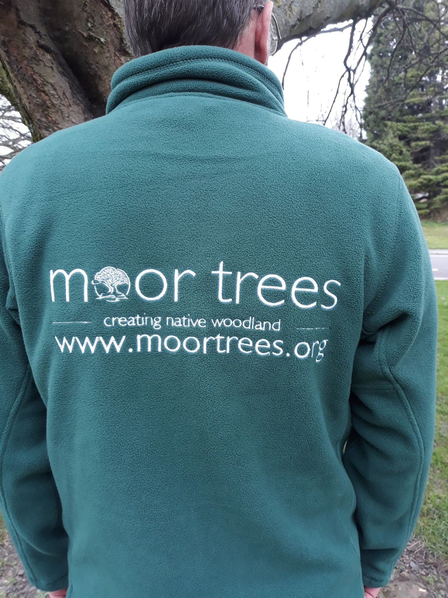Unisex half zip fleece hoodie embroidered with Moor Trees logo