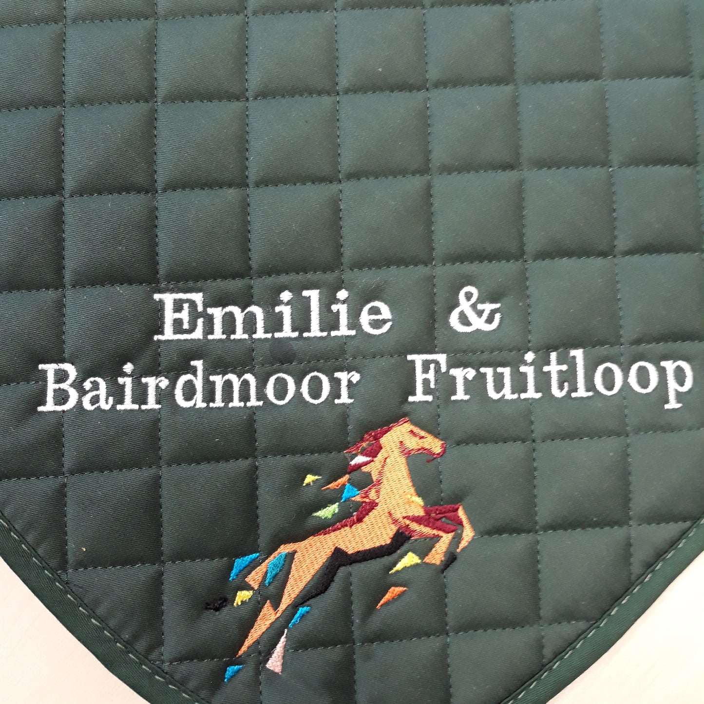 personalised saddlecloth, dark green saddlecloth, green saddlecloth, bespoke saddlecloth, personalised horse hoodies, personalised equestrian wear